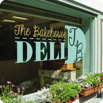 Bakehouse Deli Branding and Packaging in Cafe Window.